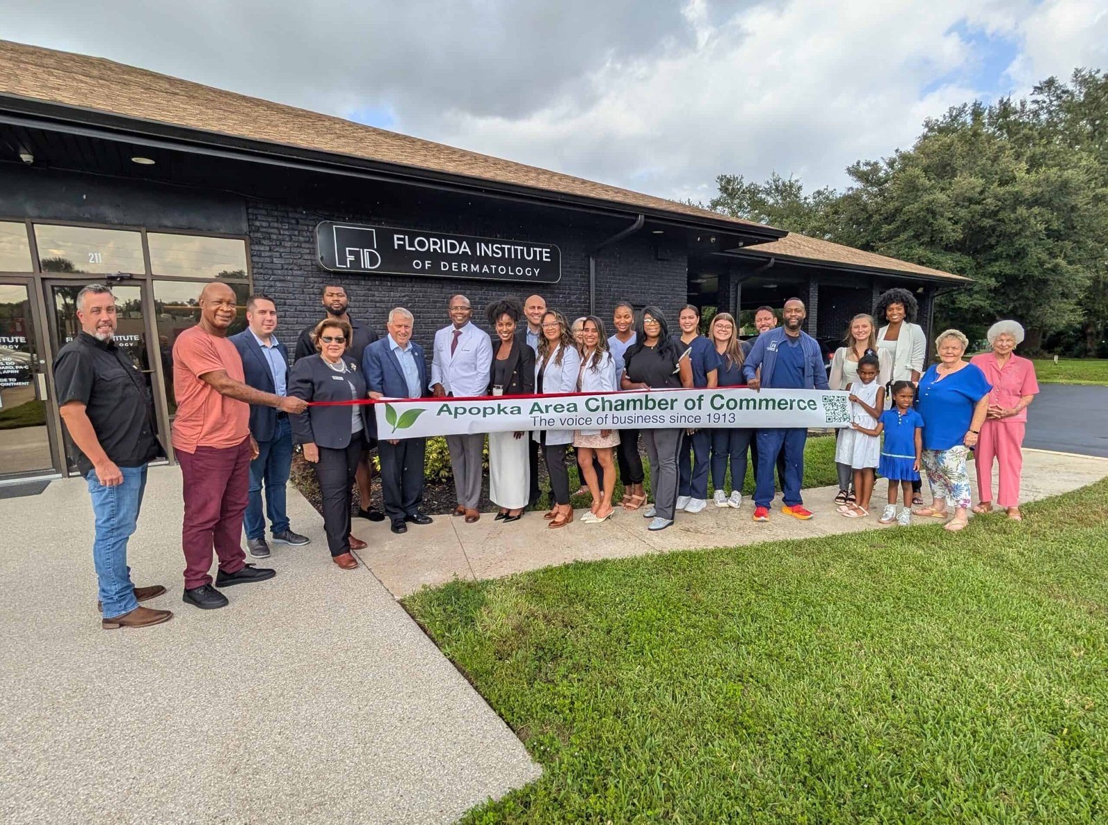 Community leaders and members celebrate the grand opening of Florida Institute of Dermatology, highlighting Apopka Area Chamber of Commerce support for local business growth and community development.